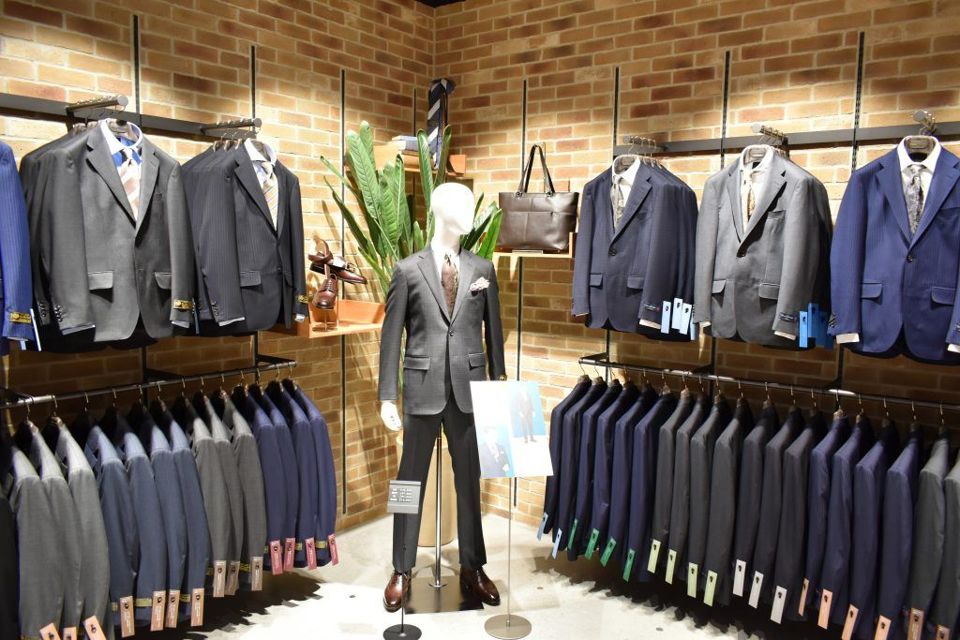 Suit wall with jackets and a mannequin